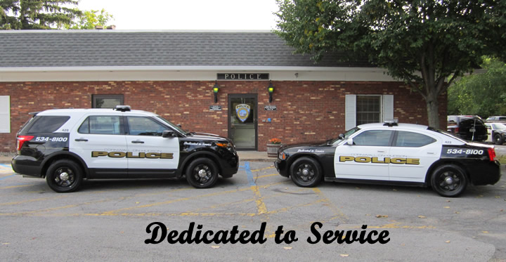 Police Station with Vehicles parked out front